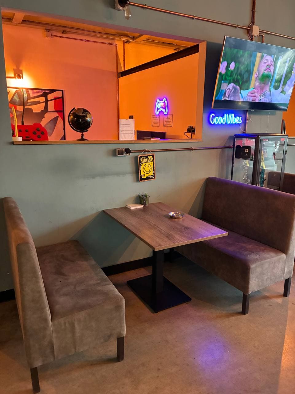 A softly lit corner booth